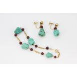 A 14ct yellow gold (stamped 14k) turquoise and garnet bracelet with matching 14ct gold screw back