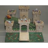 A vintage handmade wooden toy fort.