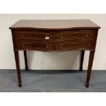A four drawer inlaid mahogany veneered cabinet, 99 x 86cm.