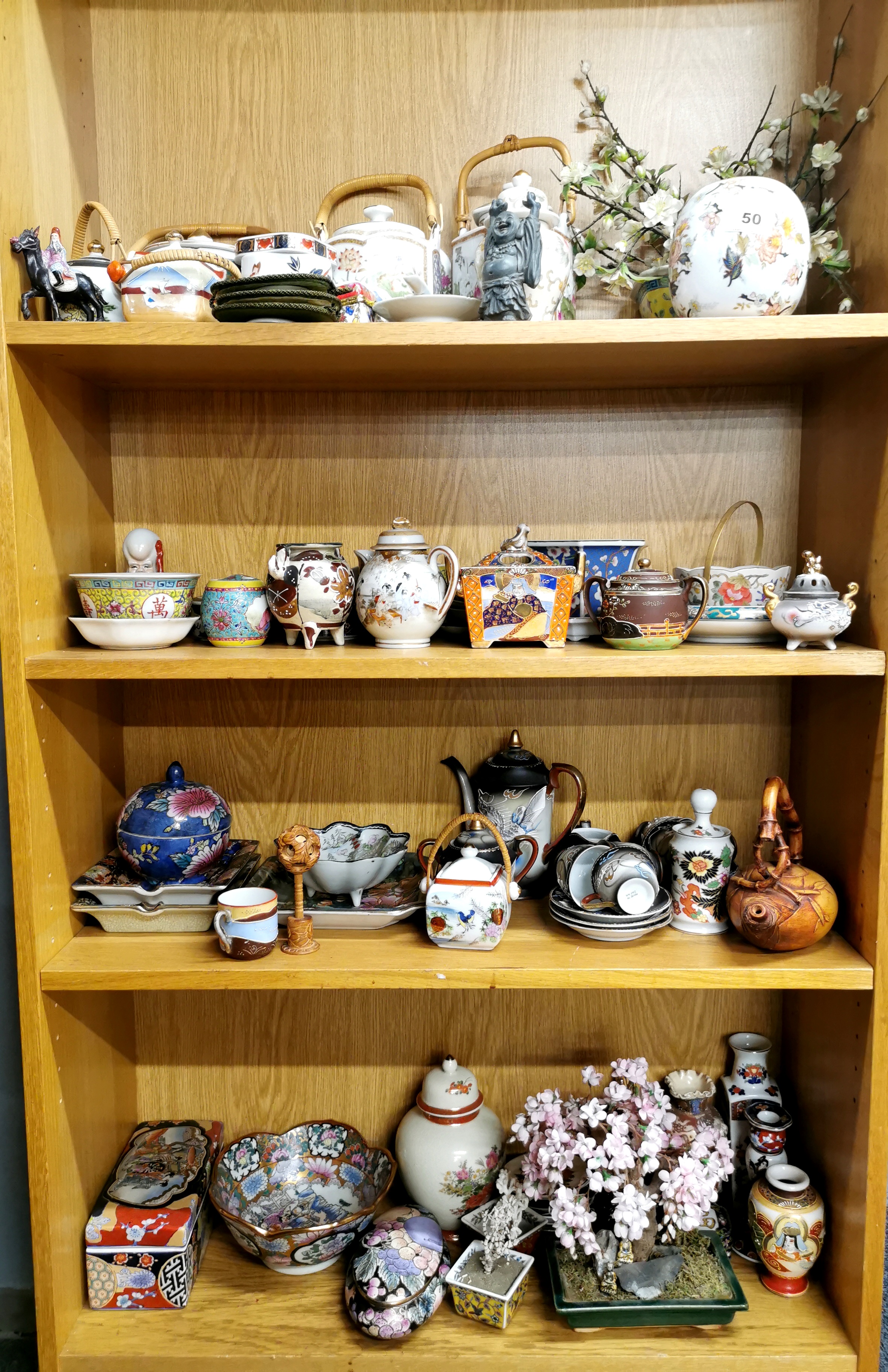 A large group of Oriental ceramic items.