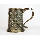 A superb hallmarked silver tankard with hammered decoration c.1780, H. 15cm.