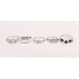 Five mixed silver rings