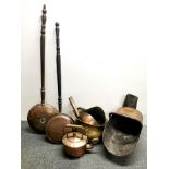 A group of antique copper and brass items.