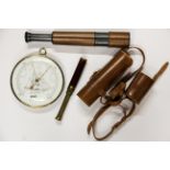A leather cased military telescope, together with a small brass telescope and a marine style