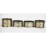 A group of four hallmarked napkin rings.