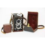 A Microcord twin lens reflex MPP camera. With leather case and light meter.