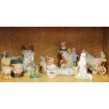 A group of Royal Doulton and other porcelain figures.