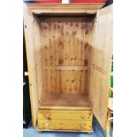 A two door pine wardrobe, W. 96cm, H. 197cm.