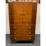 A 1960's mahogany tallboy, 76 x 129cm.