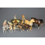 A group of Beswick and other animal and bird porcelain figures, horses ear A/F.