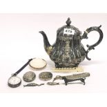 A silver plated teapot and a quantity of small items.