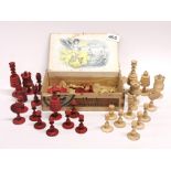 An antique carved bone chess set, king H. 10cm.