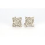 A pair of hallmarked 18ct white gold cluster earrings set with brilliant cut diamonds, L. 1.5cm.