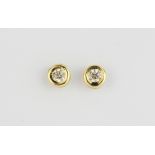 A pair of heavy quality 18ct yellow gold solitaire diamond stud earrings, diamond weight - 0.46ct in