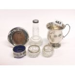 A hallmarked silver christening tankard and other items.