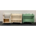 Three painted vintage wall shelves, widest W. 54cm.