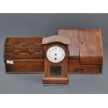 An oak stationery rack together with a mahogany stationary cabinet and a small mahogany mantle