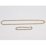 A hallmarked 9ct gold rope necklace and bracelet.