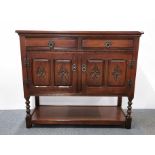 A carved oak cabinet, 107 x 41 x 92cm. together with a similar corner cabinet.