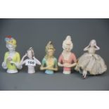 A group of five porcelain and 'chalk' half dolls, tallest 14cm.