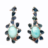 A pair of 925 silver drop earrings set with cabochon cut larimar and pear cut sapphires, L. 3.6cm.