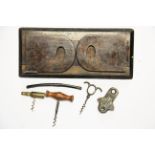 A Victorian folding bookrack, 3 corkscrews, a Japanese letter opener and a LMS railway item.