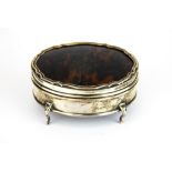 A hallmarked silver and tortoise shell jewellery case, W. 9cm. D. 4cm.