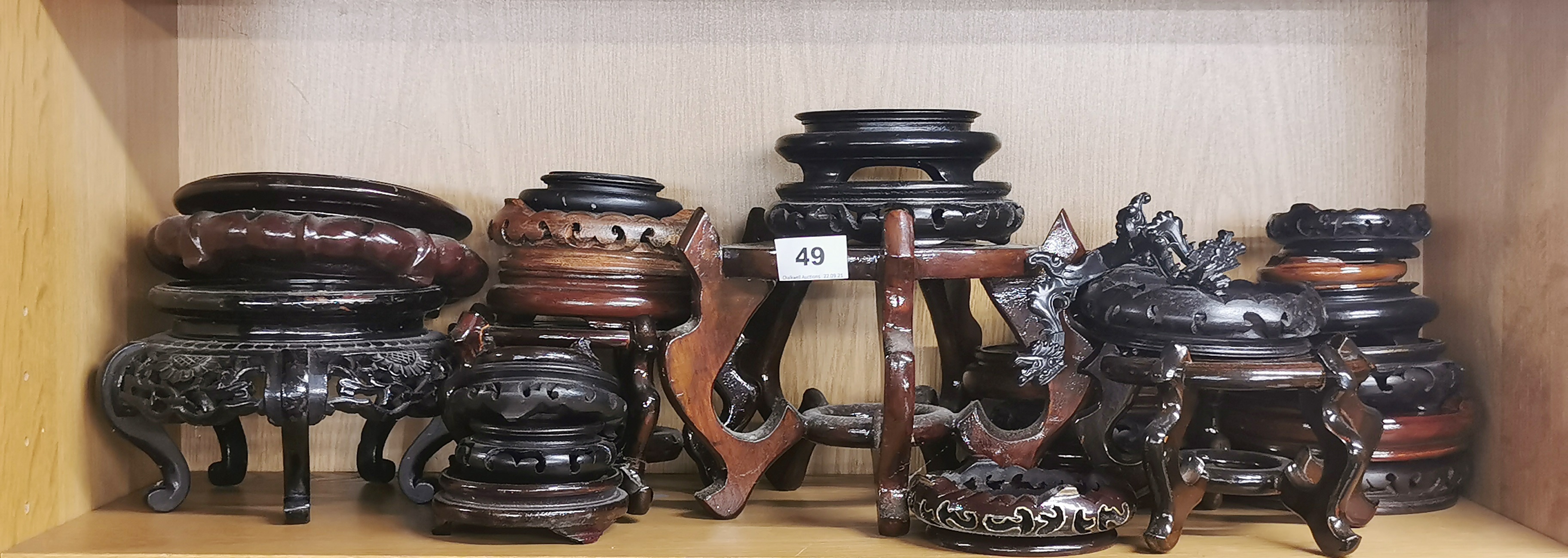A large group of Chinese wooden stands.