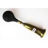 An antique Desmo brass car horn.
