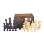 An antique turned ivory and ebony chess set, King H. 7.5cm.