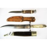 A mother of pearl handled dagger, L. 35cm. together with an antler handle dagger.
