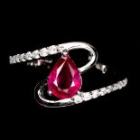 A 925 silver ring set with a pear cut ruby and white stones, (L.5).