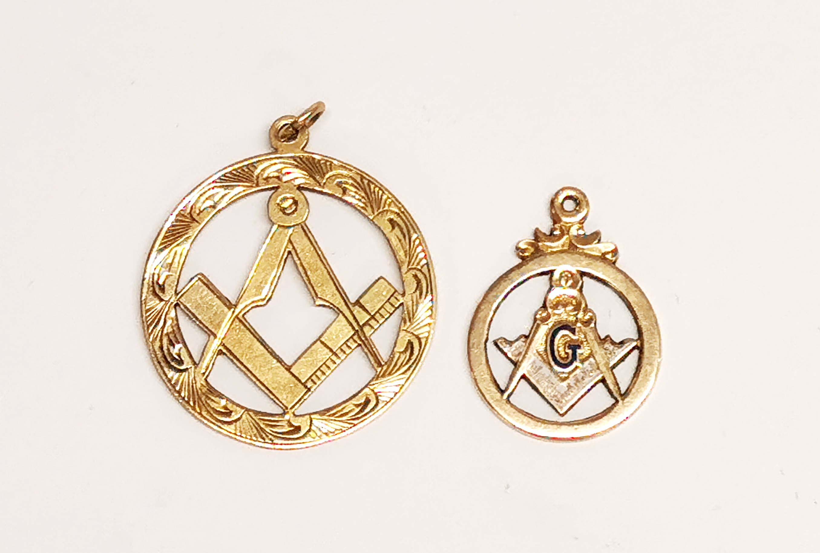 Two 9ct gold masonic fobs.