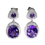 A pair of 925 silver drop earrings set with oval cut amethyst and white stones, L. 3cm.