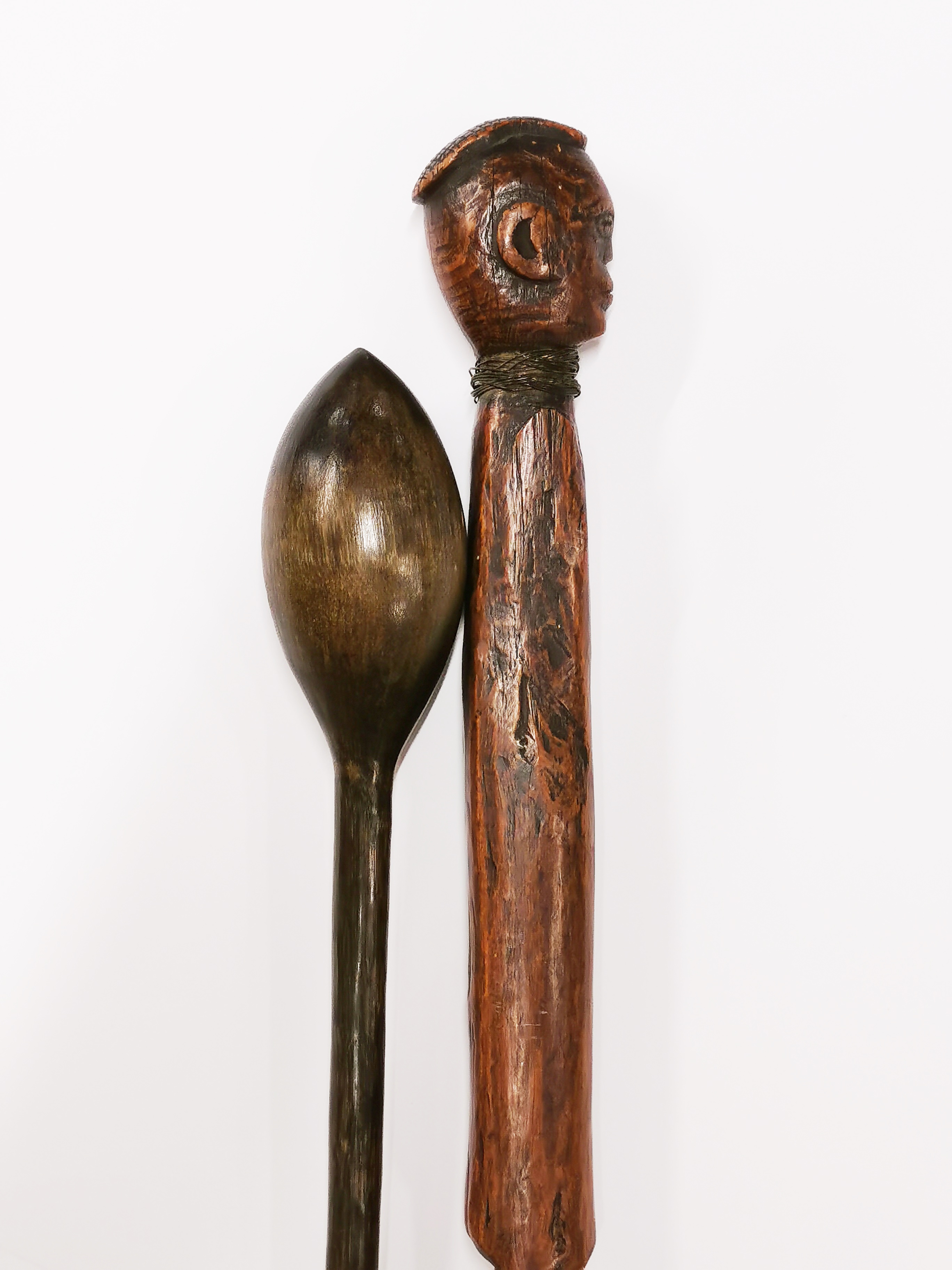 An African carved wooden tribal stick with brass wire binding, L. 68cm. together with a knobkerrie. - Image 3 of 3