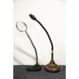 An early angle poise table lamp and an angle poise magnifying glass.