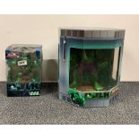 Two collectible Marvel Hulk figures.