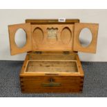 An antique Chinese pine travelling box with inset photo frames 20 x 30 x 14.