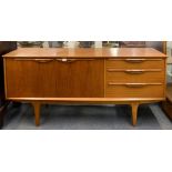 A 1970's teak sideboard, 168 x 44 x 73cm.