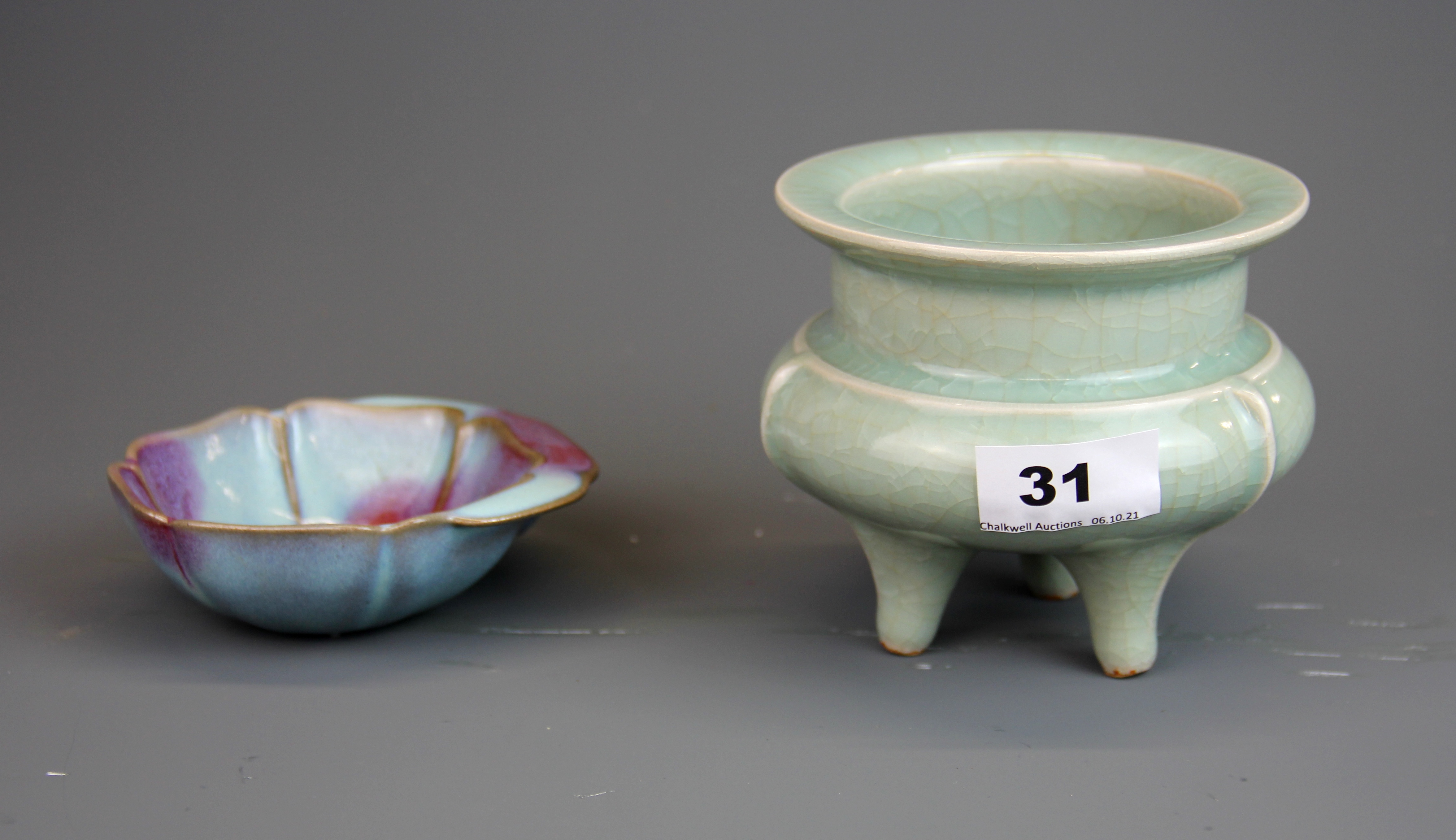 A Chinese celadon crackle glazed three foot censer, H. 11, Dia. 12cm, together with a small Zhun