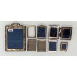 A collection of nine silver hallmarked frames, largest frame size 22 x 17.5cm.