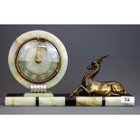An Art Deco onyx and gilt metal mantle clock, W. 38, H. 22cm. Understood to be in working order.