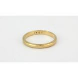 An 18ct yellow gold wedding band, (M.5).