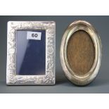A hallmarked silver child's photo frame, 13 x 17cm (engraved) together with a further hallmarked
