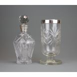 A hallmarked silver collar cut glass vase together with a silver collar cut crystal glass