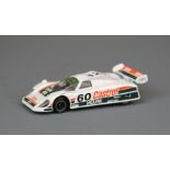 A Corgi die cast model of a Jaguar XJR9 Castrol advertising edition.