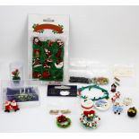 A quantity of dolls house Christmas decorations.