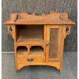 An Arts & Crafts oak wall cabinet, 68.5 x 68 x 22.5cm.