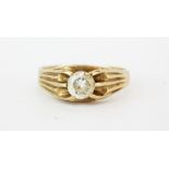 A gentleman's 9ct yellow gold stone set ring, (T).