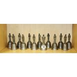 A set of 13 Crown and Rose cast pewter bells depicting Jesus and his 12 disciples (one clanger A/